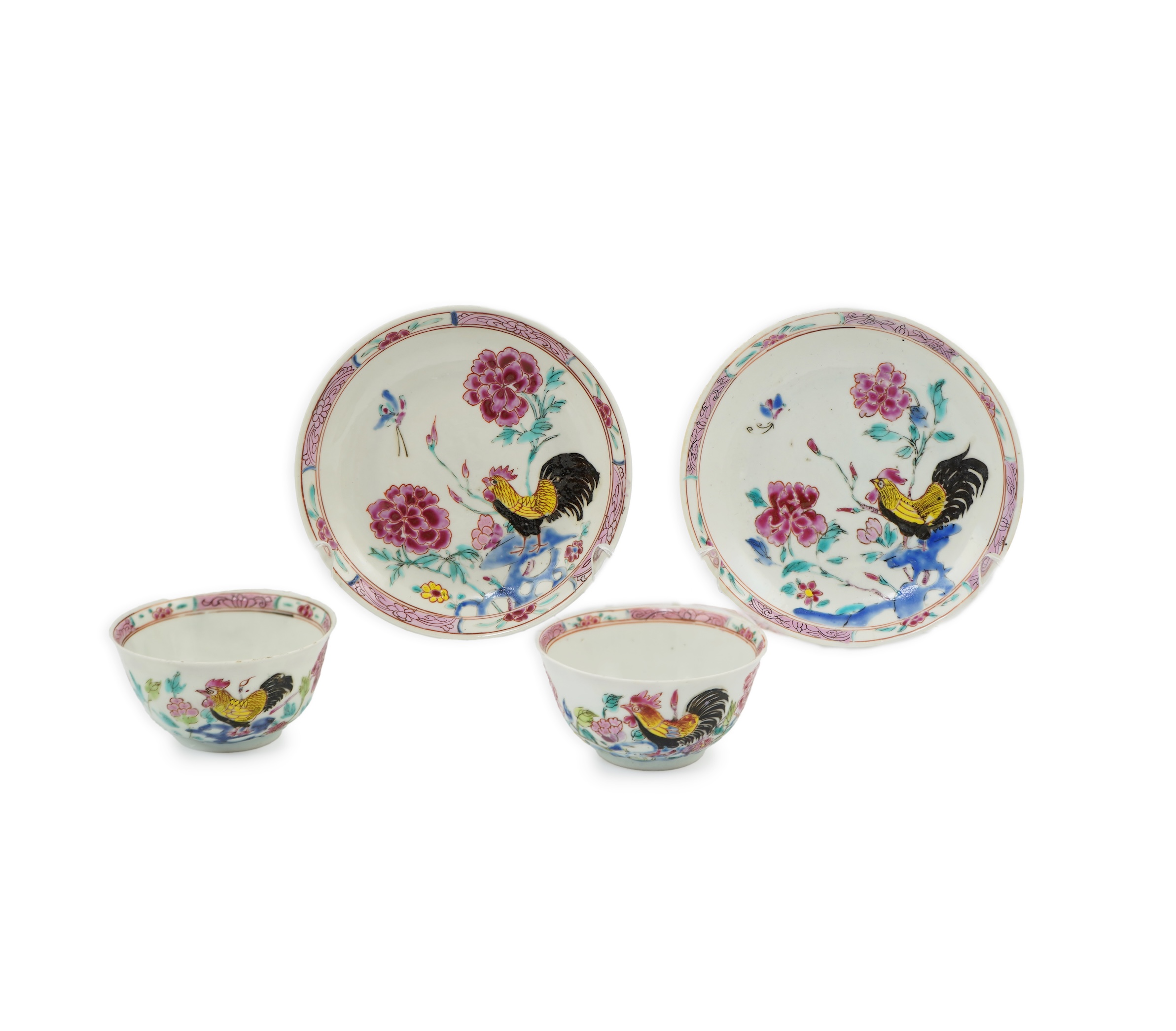 A near pair of Chinese famille rose ‘cockerel’ tea bowls and saucers, Yongzheng period